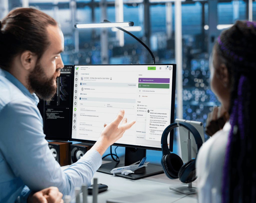 Security team members reviewing a clearance request workflow in Sign In App