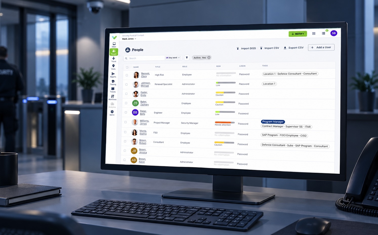 A desktop monitor with Sign In App Compliance People dashboard