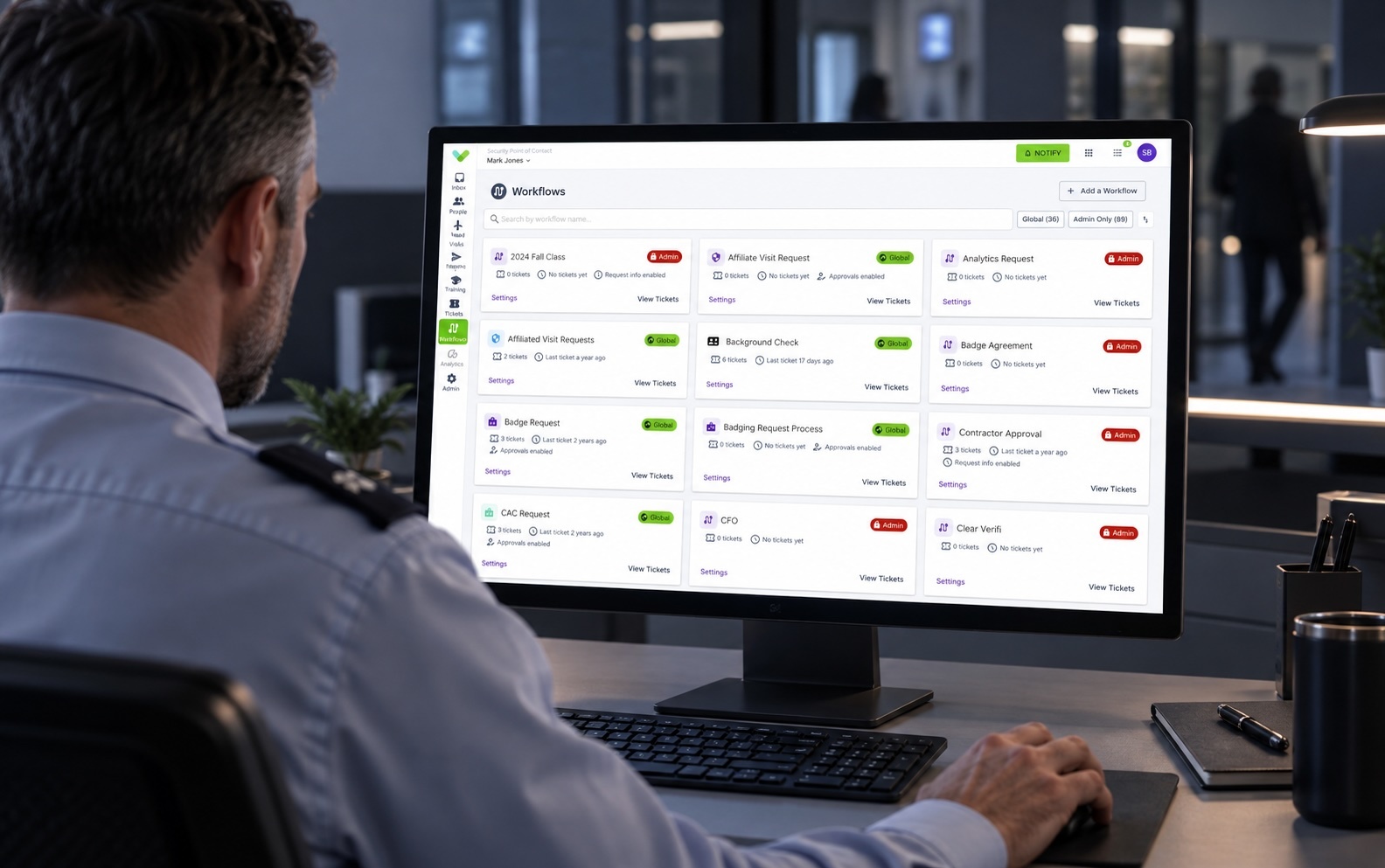 Facility security officer reviewing workflows in Sign In App